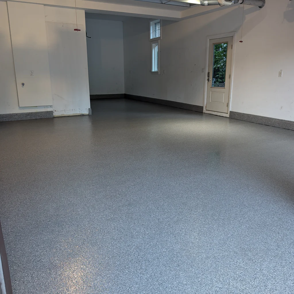 Decorative flake concrete floor coating installation