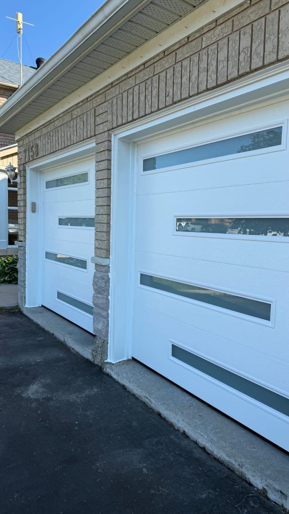 White double garage doors with horizontal window strips